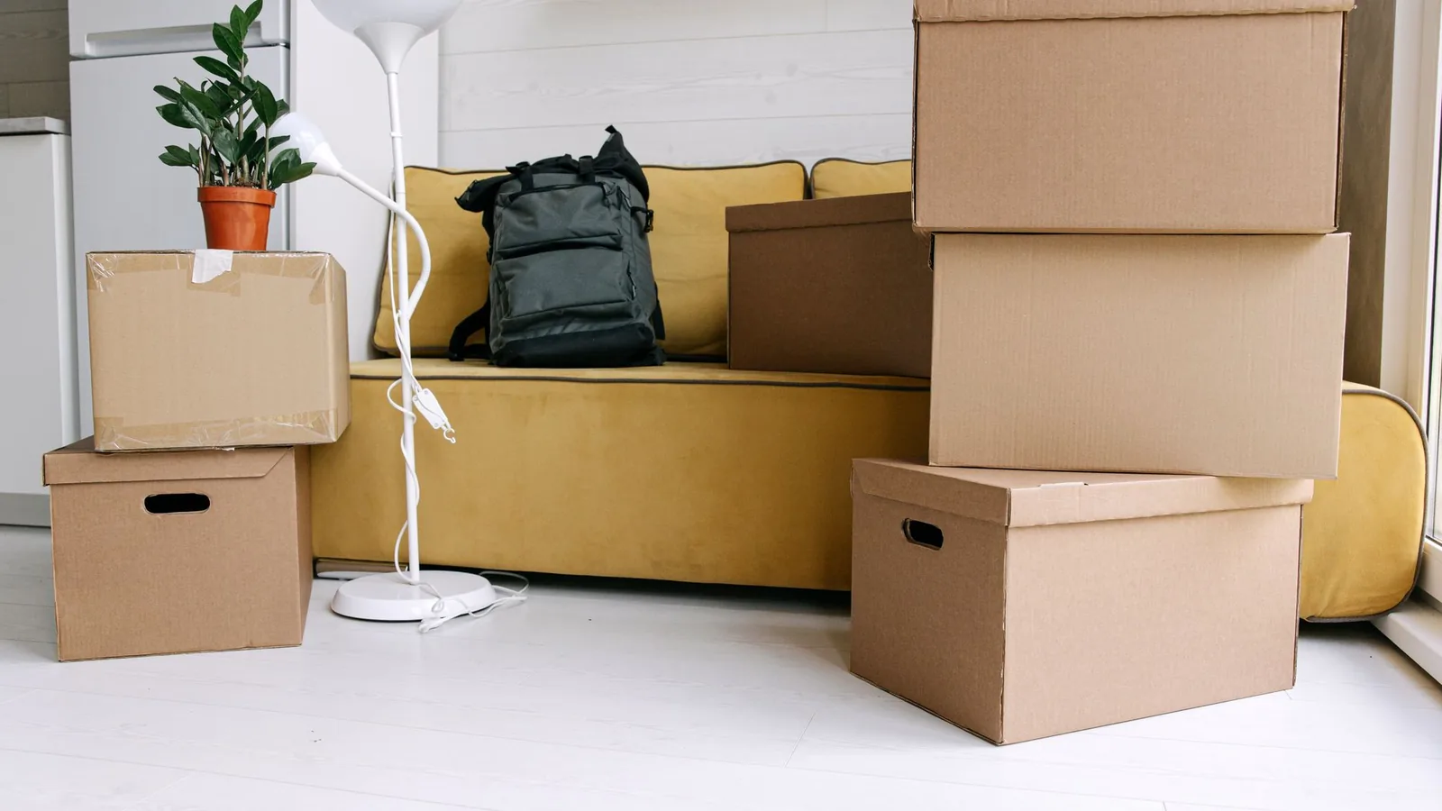 Packed moving boxes in an apartment