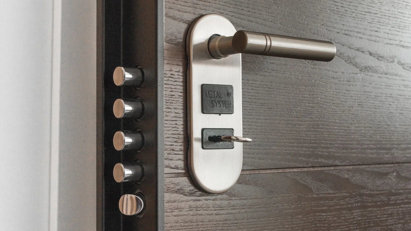 A key in the lock of a front door